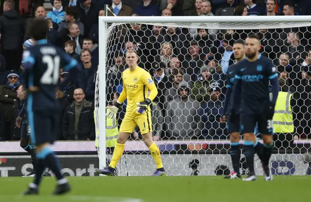 Joe Hart shows his anger with his defence