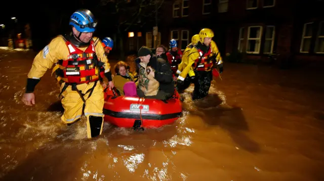 Family being rescued