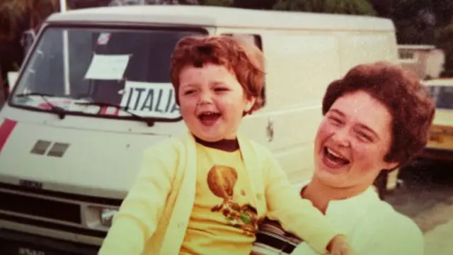 A young Claudia with her mother