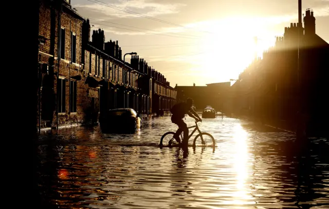 Cyclist in the water