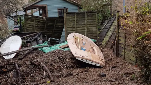 Boats in garden after flood