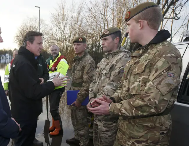 David Cameron meets rescuers in Carlisle