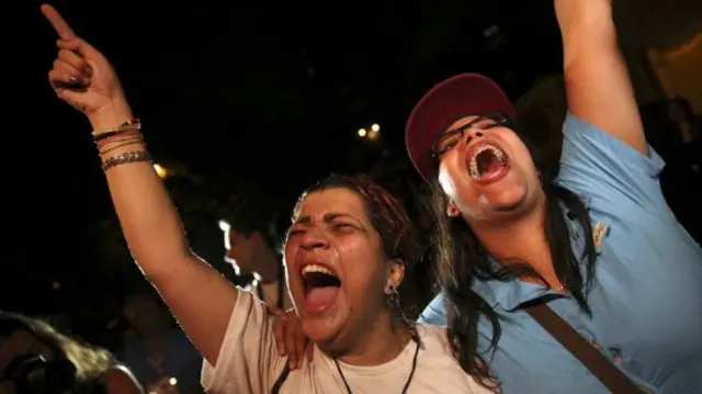 Voters celebrating in Venezuela