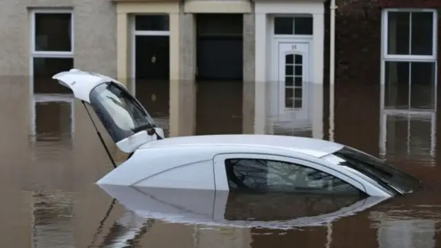 Car submerged in flood water