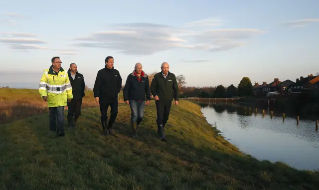 David Cameron tours flood defences