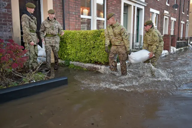 Military personnel help with flooding in Carlisle