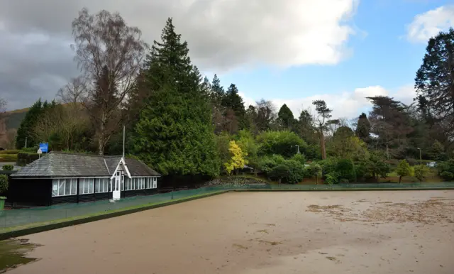 Kewsick bowling green covered in mud