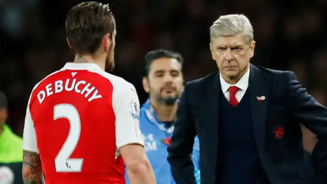 Mathieu Debuchy and Arsene Wenger