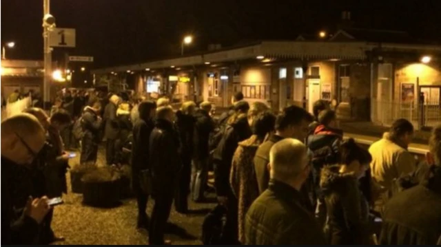 Commuters waiting on the 06:30 train to Edinburgh at Dunfermline