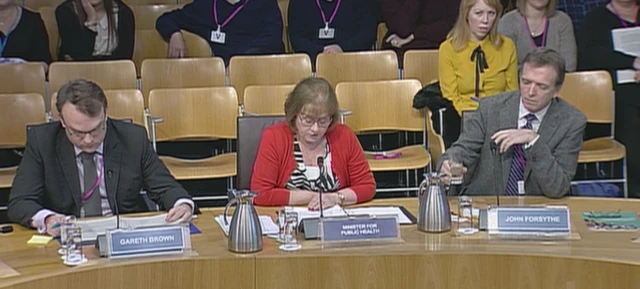 Gareth Brown, Maureen Watt and John Forsythe during the Health Committee