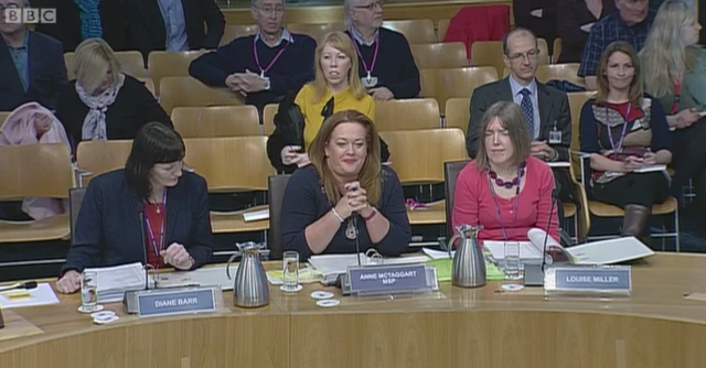 Labour MSP Anne McTaggart and Diane Barr from the Non-Government Bills Unit and Lousie Miller from the Office of the Solicitor to the Scottish Parliament.