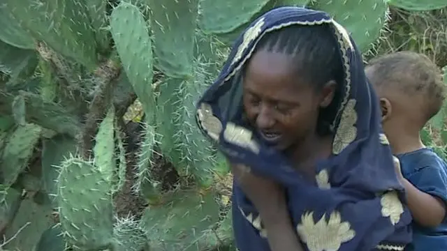 Woman with son in drought-affected Ethiopia