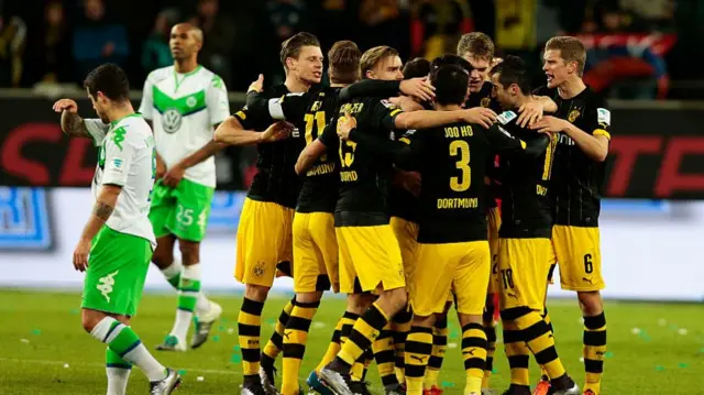 Dortmund celebrate against Wolfsburg