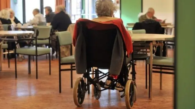 Elderly woman in a wheelchair