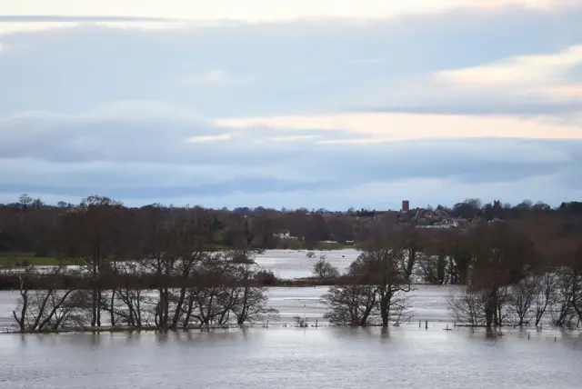 Floodwater from the river Petteril covers meadows on the outskirts of Carlisle on December 6, 2015.