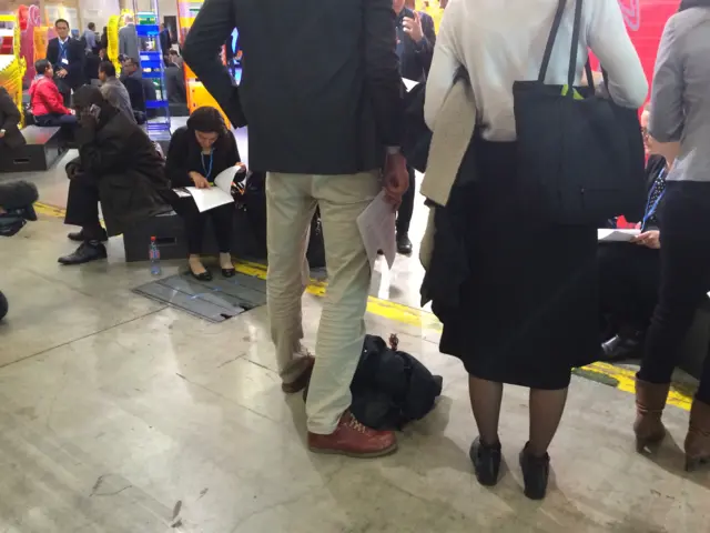 delegates holding copies