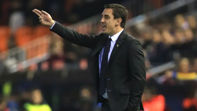 Gary Neville instructs