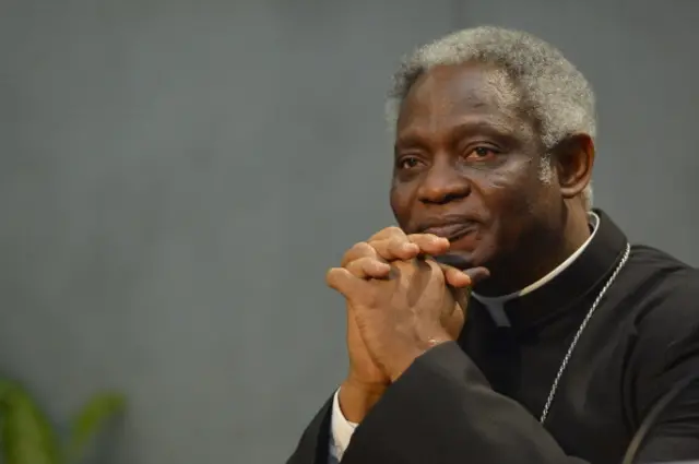 Ghanaian cardinal Peter Kodwo Appiah Turkson attends the signature of the 'Global Freedom Network' agreement between representatives of Catholic church, the Anglican church and Sunni University Al-Azhar to fight against 'modern forms of slavery and human trafficking,' on March 17, 2014 at the Vatican