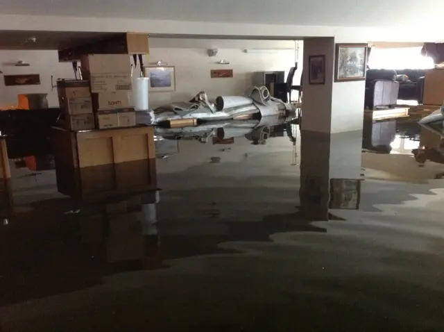 Inside flooded boathouse