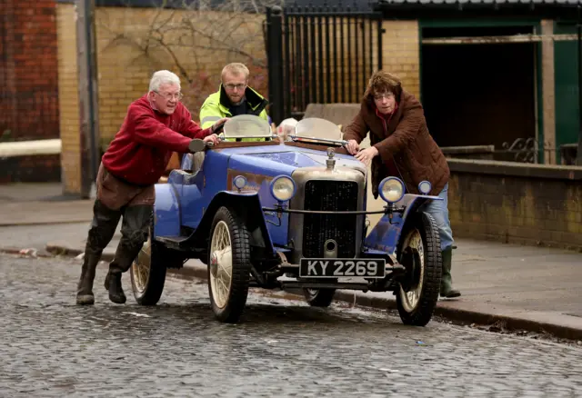 Residents recover their water damaged vintage 1932 Jowett car in Carlisle