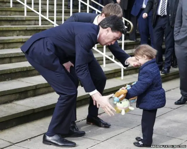 Ed Miliband meets four-year-old Jennifer Talbot Bagnall at Bury town hall