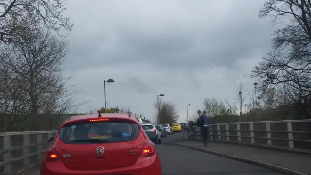 Queue of cars on a road leading to the venue for the SNP manifesto launch - 20 April 2015