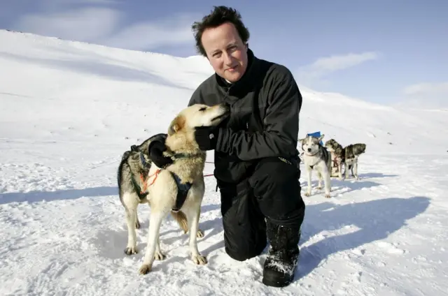 David Cameron and a husky in 2006