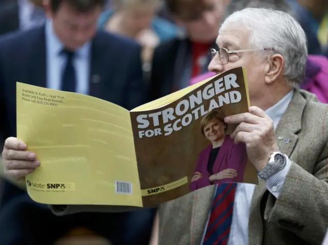 Man holding SNP manifesto