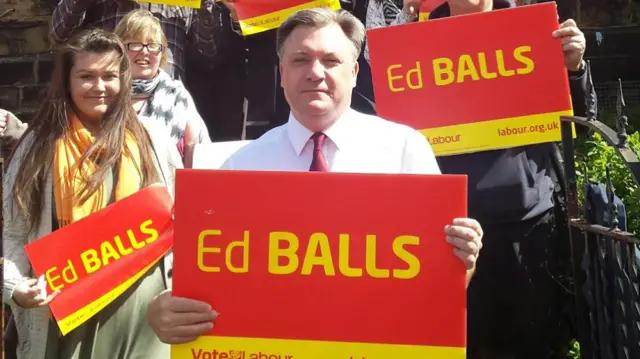 Ed Balls with "Ed Balls" sign