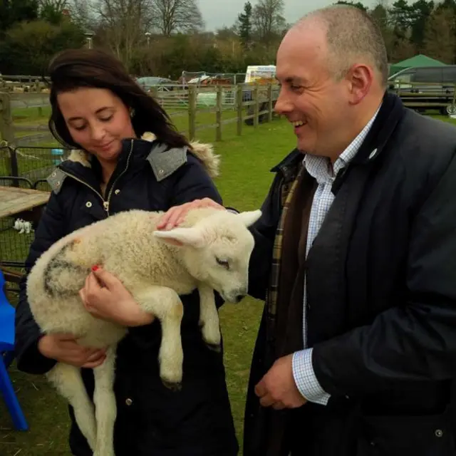 Conservative Robert Halfon strokes a lamb