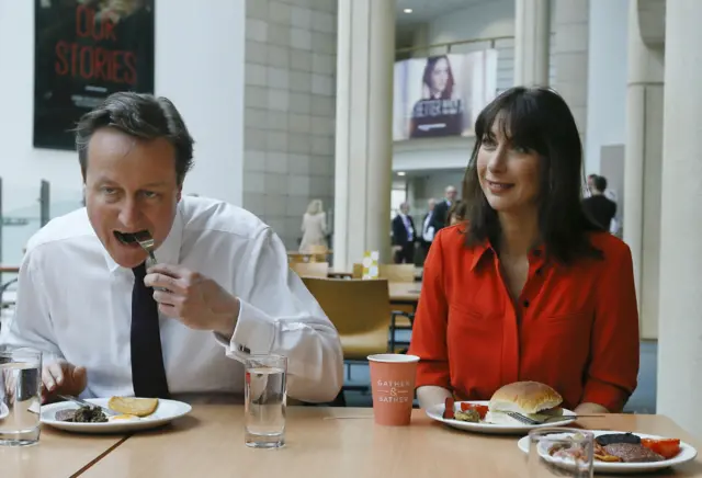 David Cameron and his wife Samantha eat breakfast during a visit to financial firm Scottish Widows in Edinburgh - 7 April 2015