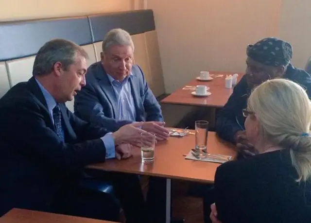 Nigel Farage with voters in Dudley pub