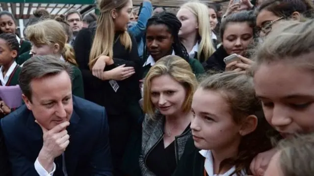 David Cameron with schoolchildren