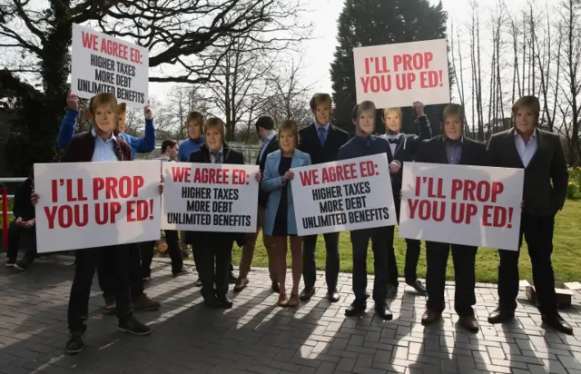 Protesters dressed as Nicola Sturgeon