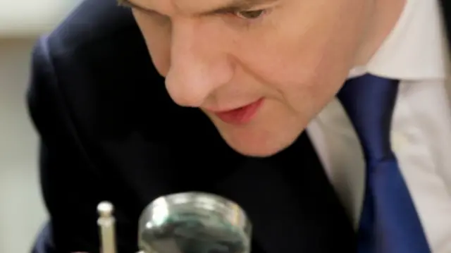 George Osborne with a magnifying glass