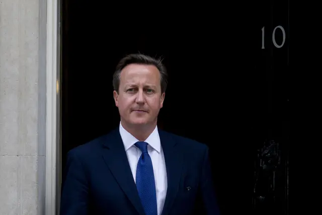 David Cameron at the door of number 10