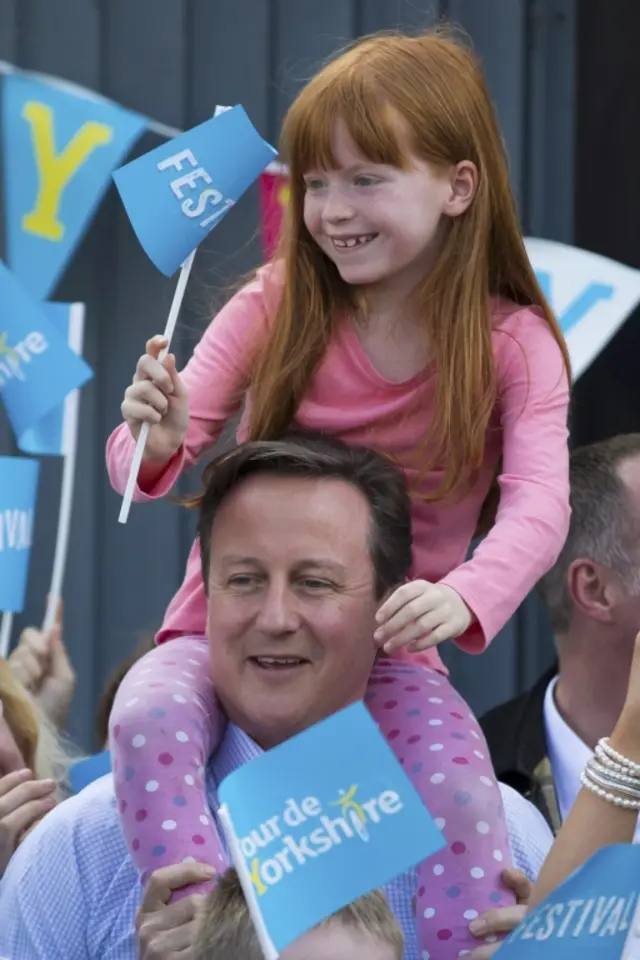 David Cameron with seven-year-old Amelie Bone on his shoulders