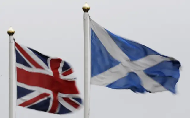 Union Jack flag and Saltire Scottish flag flying together