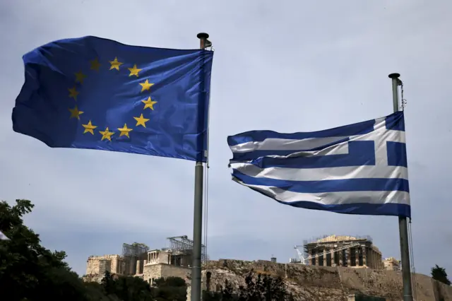 Greek and EU flags