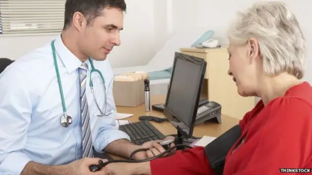 GP treating patient (stock image)