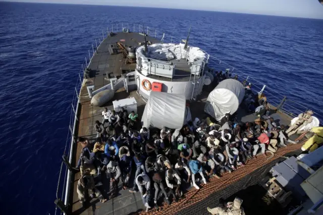 Italian naval vessel carrying rescued migrants