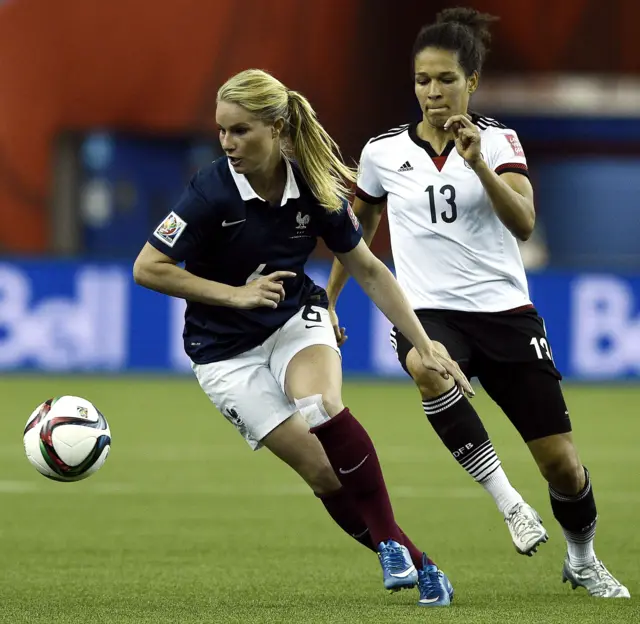 Celia Sasic challenges for the ball