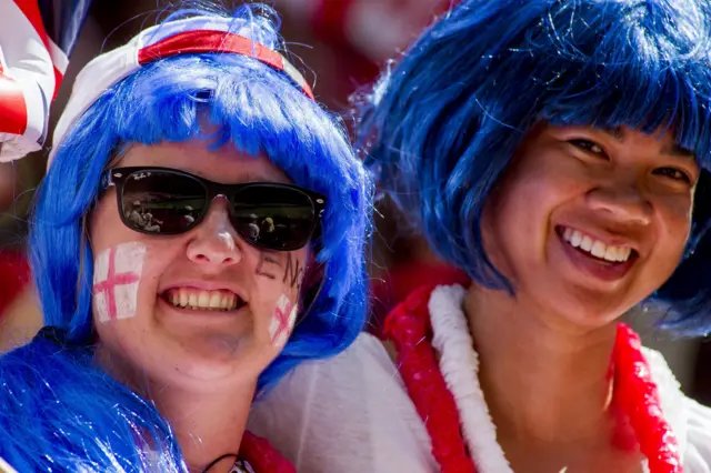 English fans cheer their team