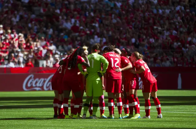 Canada team huddle