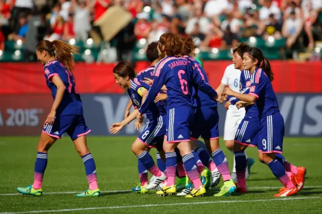 Aya Miyama celebrates