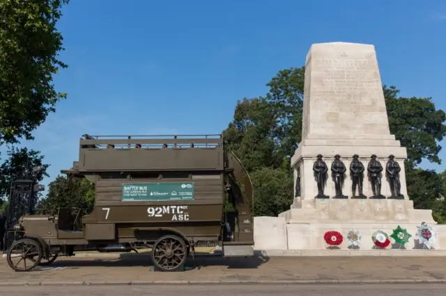 A First World War London Battle Bus which carried troops to Somme is seen beside the Guards Memorial at Horse Guards Parade