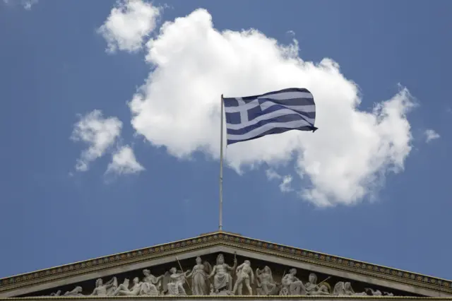 Greek flag on building in Athens