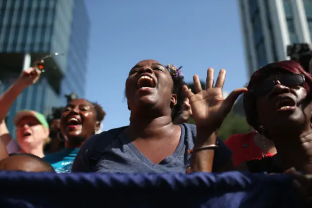 Crowds cheer as the Confederate flag comes down in South Carolina