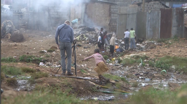 Pop Up journalist Christian Parkinson filming