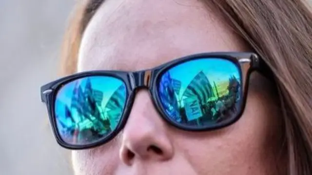 Flags reflected in sunglasses